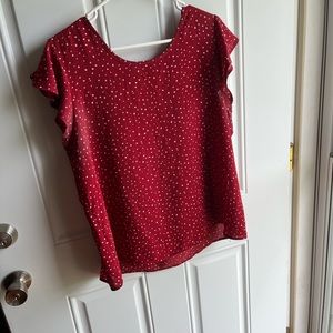Size XL women’s red & white polka dot blouse.